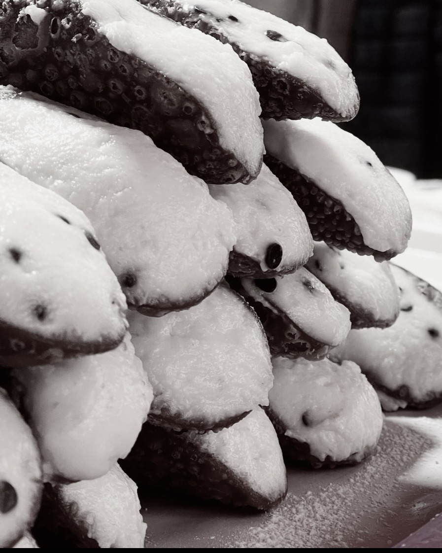 Fresh Sicilian cannolo filled with ricotta in Palermo