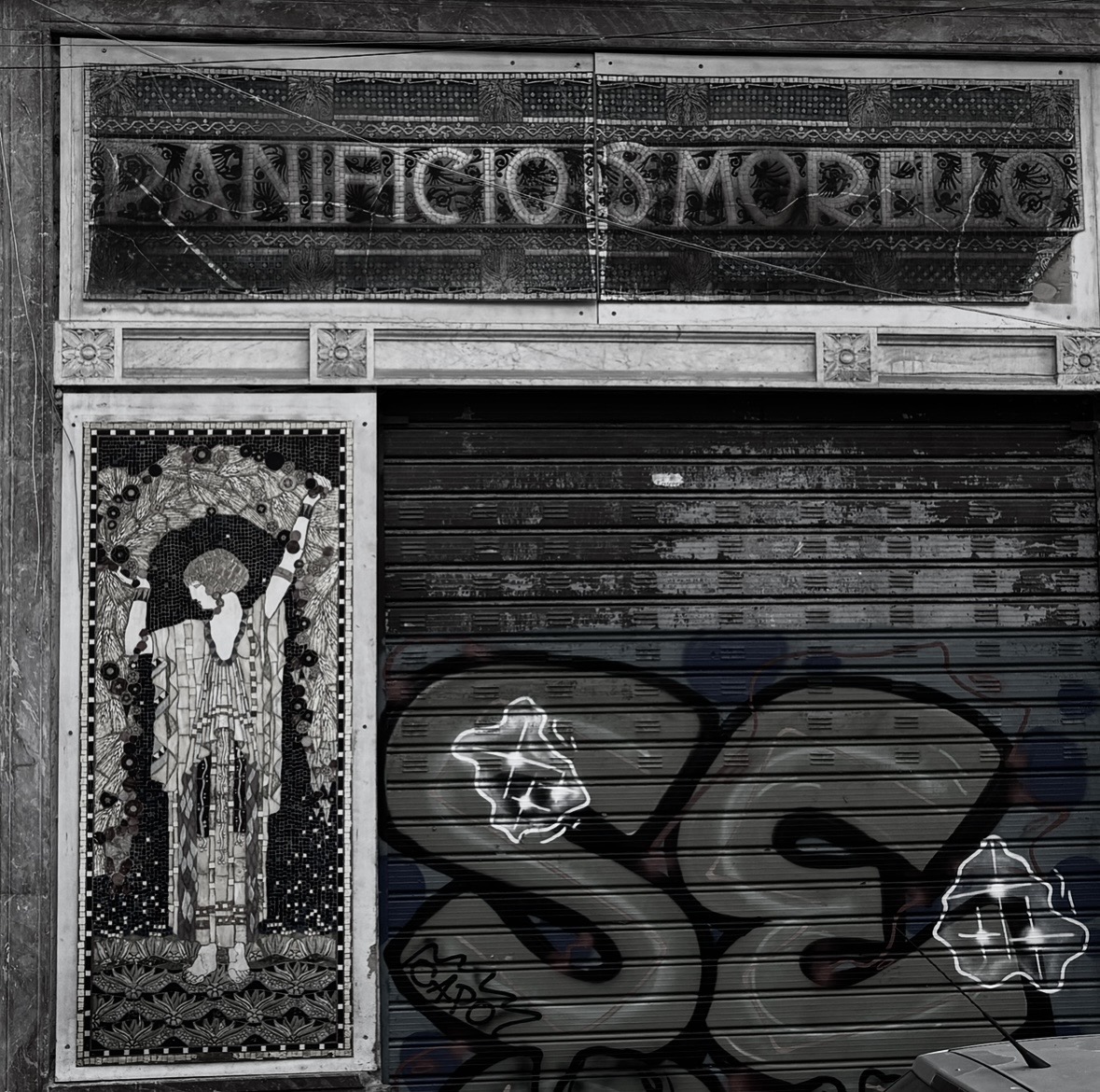 Panificio Morello storefront with a Pupa del Capo mural in Palermo