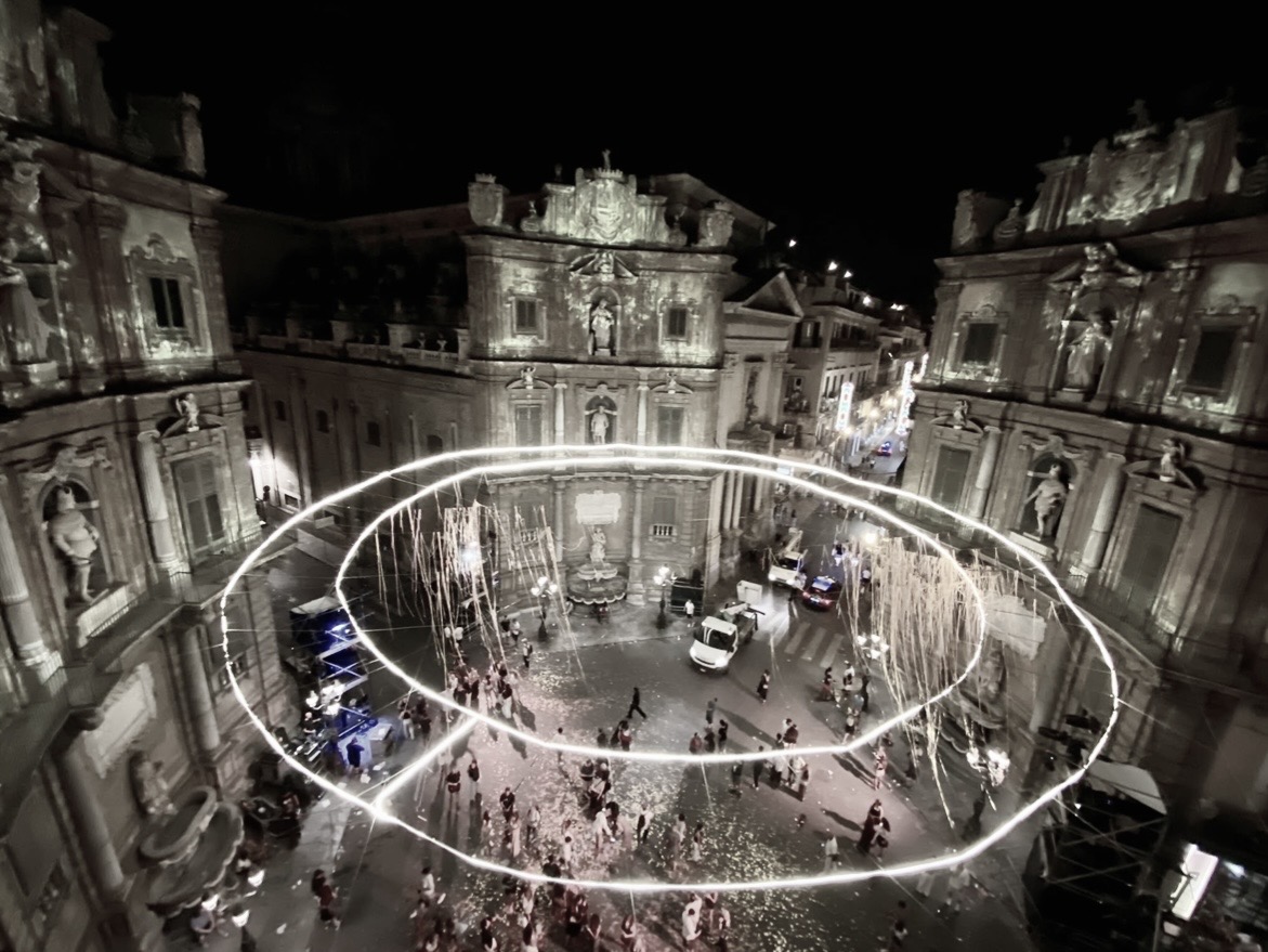 Night view of Quattro Canti in Palermo illuminated during a light show
